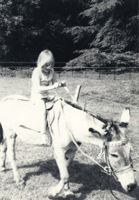 Young girl on a donkey